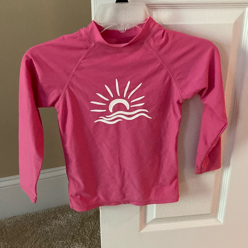 Girls swim shirt. Great when cold in the pool. Hardly wore. Pink. Longsleeve.